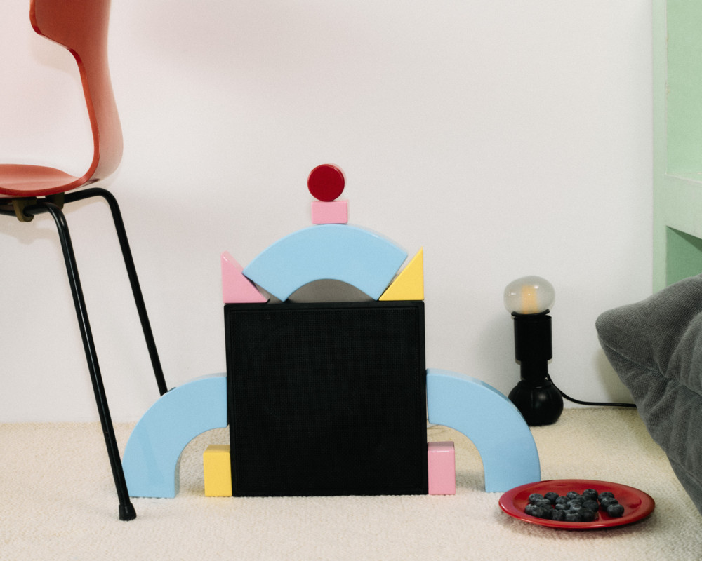 The collection's playful micro-modules by nara.world arranged into a structured composition resembling a small architectural form