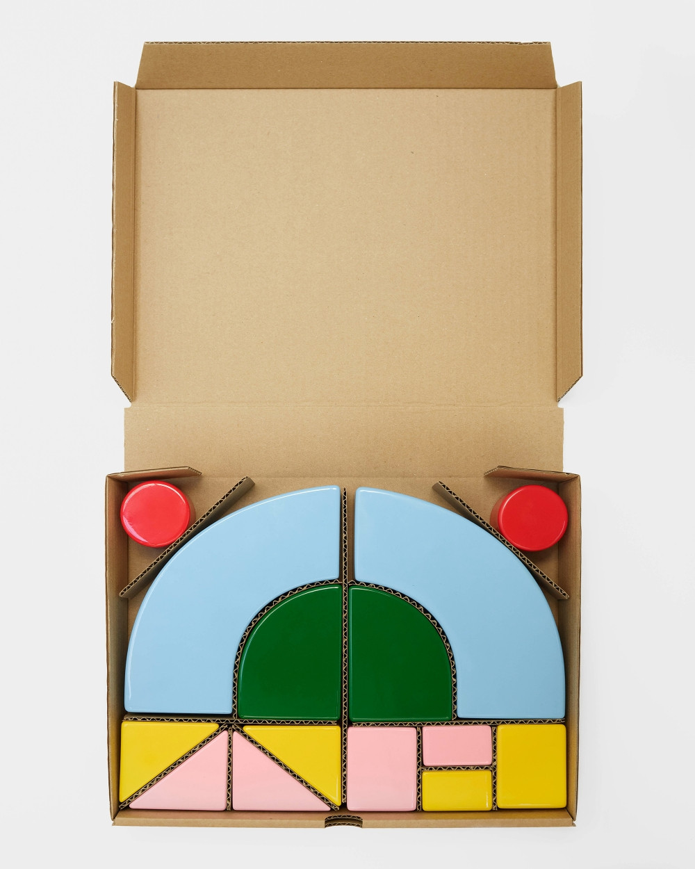 Modular elements from Little Family packaged in box by nara.world, colorful geometric set designed by Nara Lee
